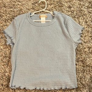 Altrd state blue baby tee with ruffles on the sleeves.